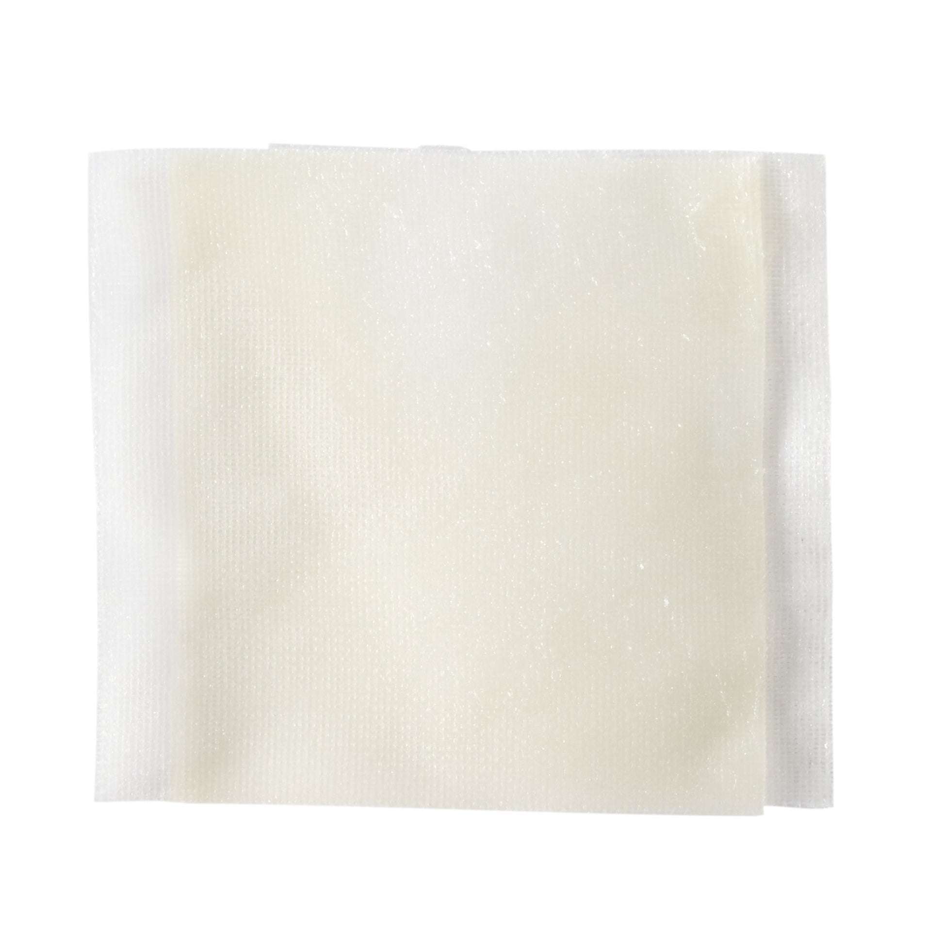 A close up displaying a sterile McKesson 61-20056 3 by 9 inch non adhering petrolatum gauze wound dressing.