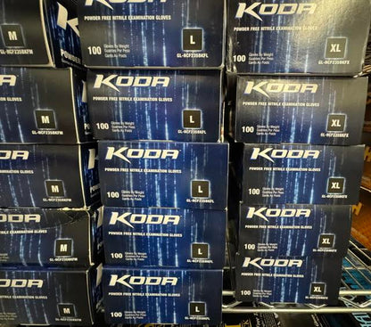 Boxes of Adenna Koda light blue nitrile powder-free medical examination gloves at Lexicon Medical Supply. 