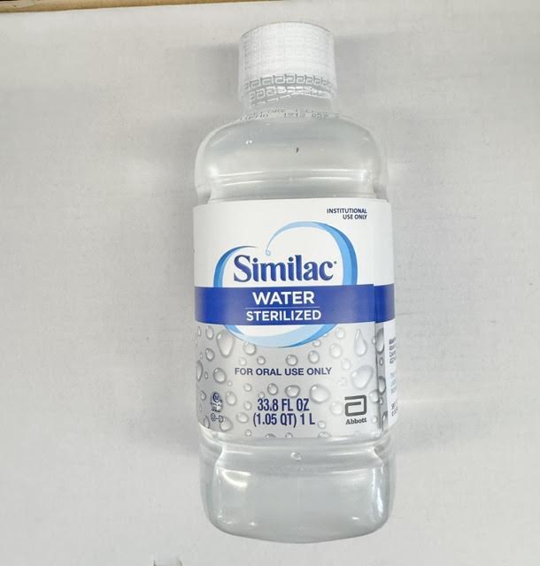 An individual 1 Liter bottle of Abbott Similac 58037 ready-to-use sterilized water at Lexicon Medical Supply.
