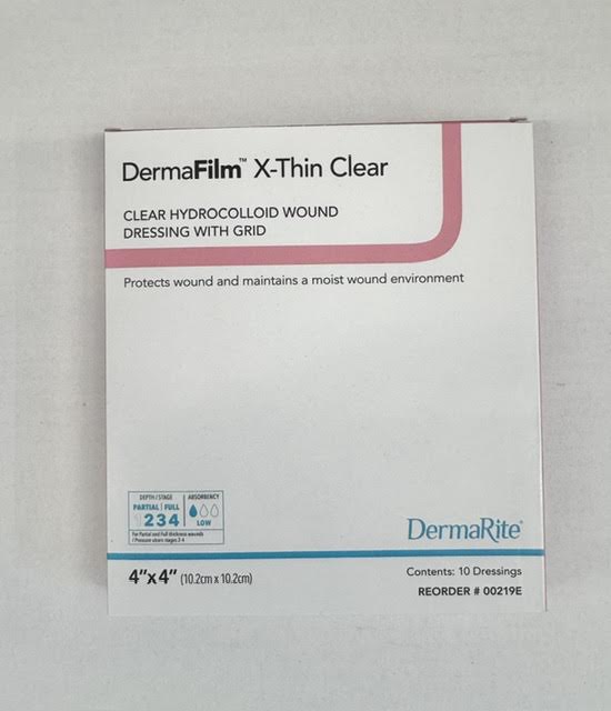 A Box of DermaFilm 00219E X-Thin Clear hydrocolloid wound dressing with grid on a gray background