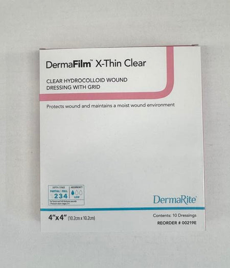 A Box of DermaFilm 00219E X-Thin Clear hydrocolloid wound dressing with grid on a gray background