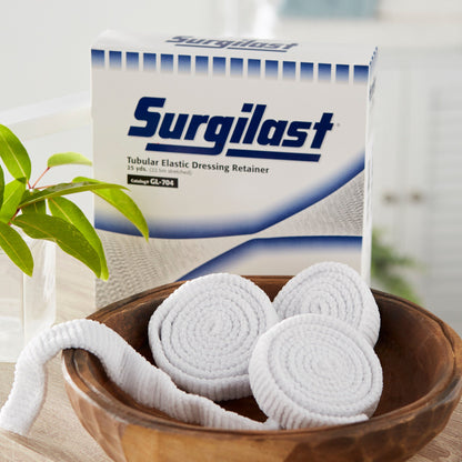 Close up of the breathable white tubular elastic stretch net on a Surgilast GL-704 bandage retainer roll.
