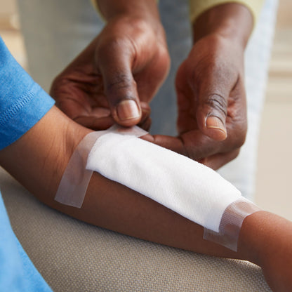 Close up of a lint-free white 4x4 McKesson poly-rayon blend non-woven gauze sponge.